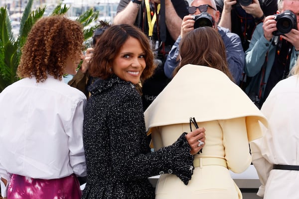 Jury members Leila Slimani, left, and Halle Berry, pose with jury president Juliette Binoche at the jury photo call at the 78th international film festival, Cannes, southern France, Tuesday, May 13, 2025. (Photo by Joel C Ryan/Invision/AP)
