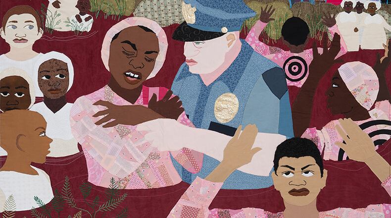 "Baptizing Our Children in a River of Blood," is one of the searing images in the racial justice quilts of Atlanta textile artist Dawn Williams Boyd. Body's show "Cloth Paintings," is now on view virtually at the Fort Gansevoort Gallery in New York City. Courtesy of Ron Witherspoon