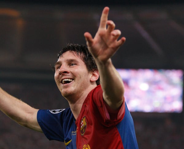 FILE - Barcelona's Lionel Messi celebrates after scoring his sides second goal during the UEFA Champions League final soccer match between Manchester United and Barcelona in Rome, May 27, 2009. (AP Photo/Luca Bruno, File)