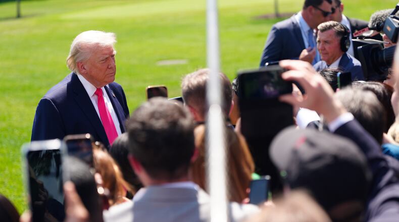 President Donald Trump speaks with reporters before departing on Marine One from the South Lawn of the White House, Thursday, April 16, 2026, in Washington. (AP Photo/Jen Golbeck)