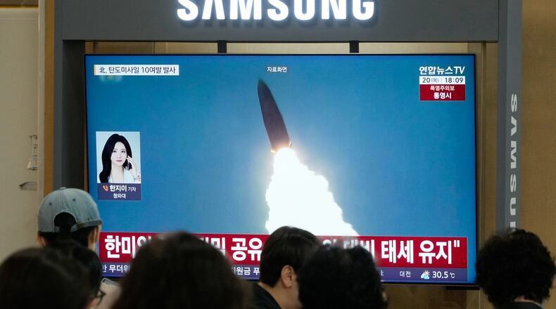 A TV screen shows a file image of North Korea's missile launch during a news program at Seoul Railway Station in Seoul, South Korea, Thursday, Aug. 20, 2026. (AP Photo/Ahn Young-joon)
