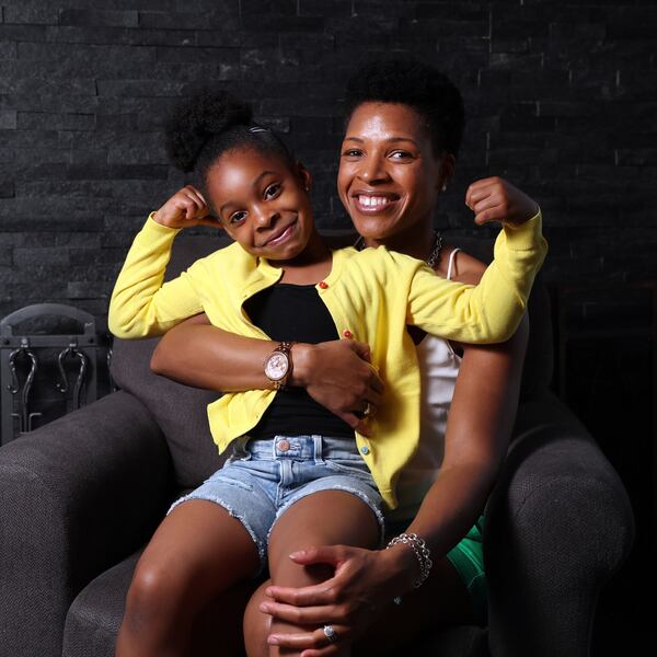 At age 29, Michelle Bradley Emebo had hypertension brought on by the pregnancy of her daughter Sarai, both shown here May 6, 2021. But Bradley Emebo changed her lifestyle to be more healthy. (Terrence Antonio James/Chicago Tribune/TNS)