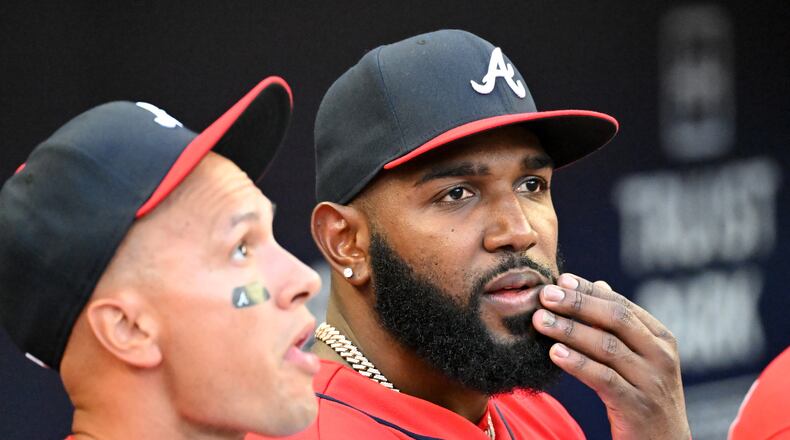 Braves' Marcell Ozuna (right) watches during the Atlanta Braves home game against Houston Astros at Truist Park on Friday, August 19, 2022. (Hyosub Shin / Hyosub.Shin@ajc.com)