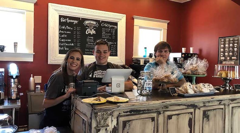 Workers at Independent Grounds, which opened in Kennesaw on Feb. 28, 2018, pose for a picture.