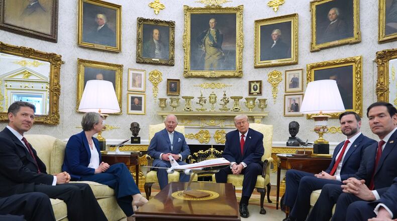 President Donald Trump and Britain's King Charles III meet in the Oval Office of the White House, Tuesday, April 28, 2026, in Washington, during a State Visit, with Britain's Ambassador to the U.S. Christian Turner, Britain's Foreign Secretary Yvette Cooper, Vice President JD Vance and Secretary of State Marco Rubio. (AP Photo/Alex Brandon)