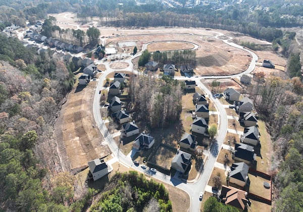 Parkview Estates in South Fulton got its start in the early 2000s, at the tail end of the housing boom, when a developer bought hundreds of acres about 10 miles west of Hartsfield-Jackson International Airport. The firm built dozens of homes, saving a handful to rent. As the bubble burst, the builder stopped building. The land was sold in 2021 to ResiBuilt Homes, an Atlanta-based company with plans to finish the subdivision as rentals. (Hyosub Shin / Hyosub.Shin@ajc.com)