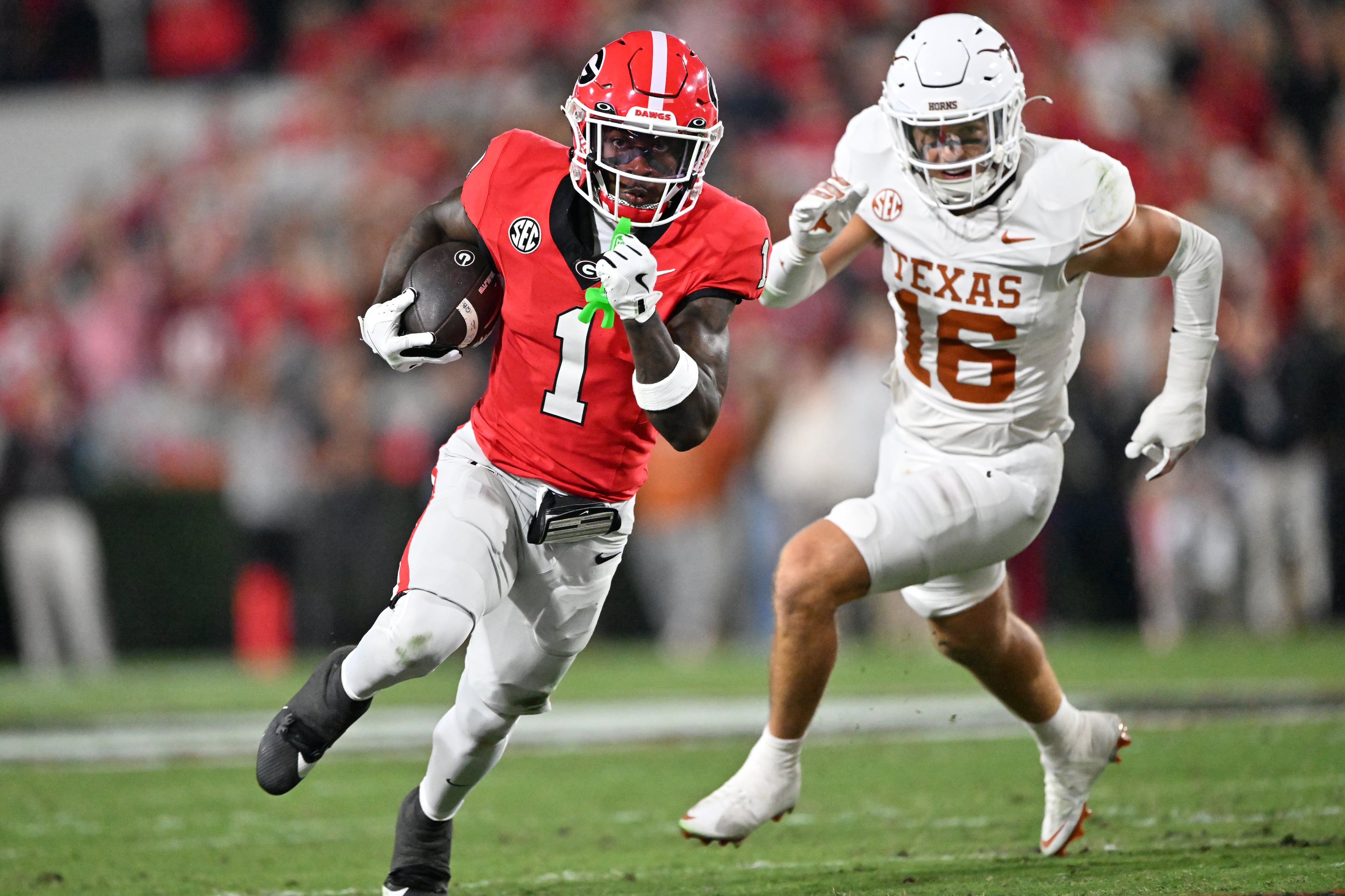 Georgia wide receiver Zachariah Branch (1) runs the ball during the first half in an NCAA football game at Sanford Stadium, Saturday, November 15, 2025, in Athens. (Hyosub Shin / AJC)