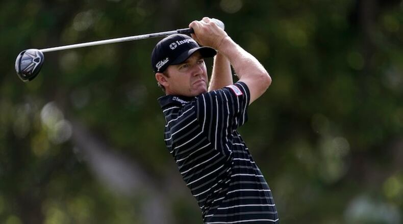 Jimmy Walker follows his drive off the first tee during the second round of the Sony Open golf tournament, Friday, Jan. 15, 2016, in Honolulu. (AP Photo/Marco Garcia)