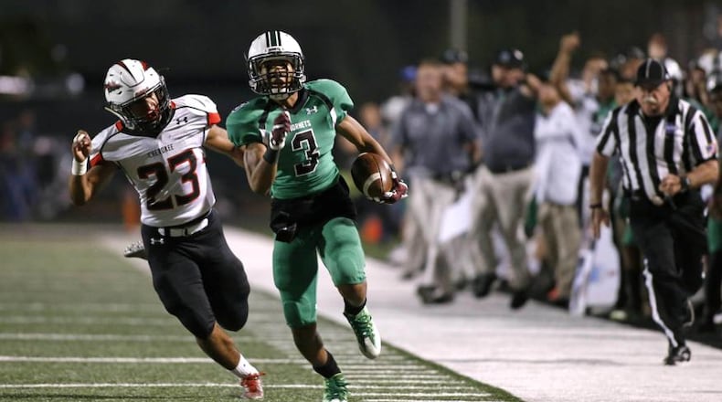 November 4, 2016 - Roswell, Ga: Roswell wide receiver Christian Ford (3) runs down the sideline against Cherokee linebacker Mckinley Hunter (23) in the first half of their game at Roswell High School Friday November 4, 2016, in Roswell, Ga. The winner is the Region 4-AAAAAAA champion. PHOTO / JASON GETZ