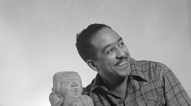 A 1943 portrait of Langston Hughes shot by Gordon Parks. Between the height of the Harlem Renaissance in 1926 and the dawn of the Black Arts Movement in 1967, Hughes wrote 16 books of poetry and more than a dozen works of nonfiction and children’s books. (Courtesy of the Library of Congress)