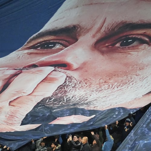 Fans tribute to Pep Guardiola coach of Manchester City 1000th game during the English Premier League soccer match between Manchester City and Liverpool in Manchester, England, Sunday, Nov. 9, 2025. (AP Photo/Jon Super)