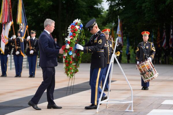 Secretary of the Army Daniel Driscoll lays a wreath at the Tomb of the Unknown Soldier at Arlington National Cemetery, honoring the Army's 250th anniversary and coinciding with President Donald Trump's 79th birthday, Saturday, June 14, 2025, in Arlington, Va. (AP Photo/Manuel Balce Ceneta)