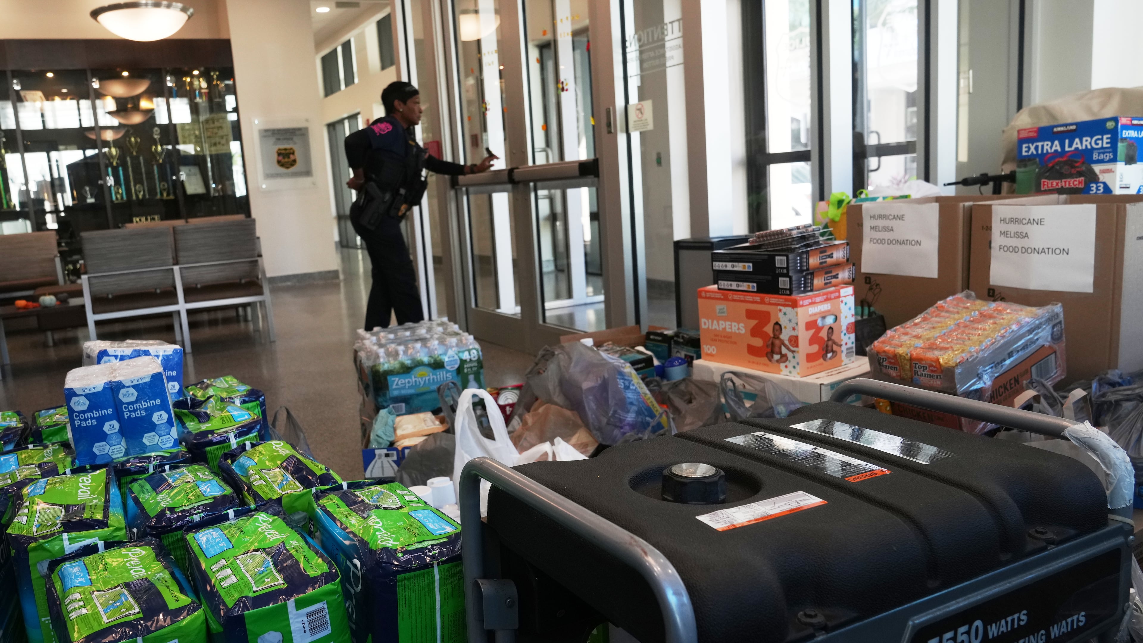 Donated emergency supplies for Jamaica sit in the lobby at the Miramar Police Department Thursday, Oct. 30, 2025, in Miramar, Fla. (AP Photo/Marta Lavandier)