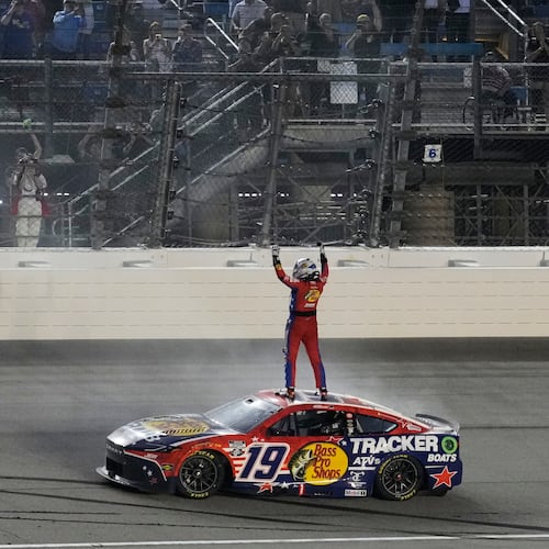 Chase Briscoe (19) celebrates after winning a NASCAR Cup Series Eero 400 auto race at Chicagoland Speedway in Joliet, Ill., Sunday, July 5, 2026. (AP Photo/Nam Y. Huh)