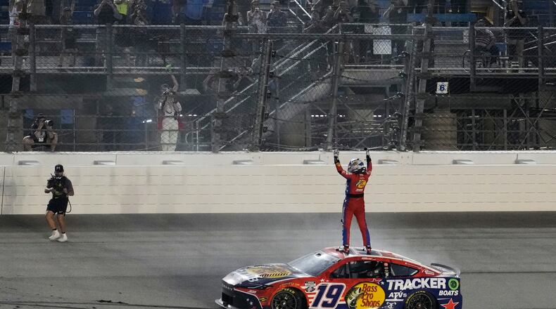 Chase Briscoe (19) celebrates after winning a NASCAR Cup Series Eero 400 auto race at Chicagoland Speedway in Joliet, Ill., Sunday, July 5, 2026. (AP Photo/Nam Y. Huh)