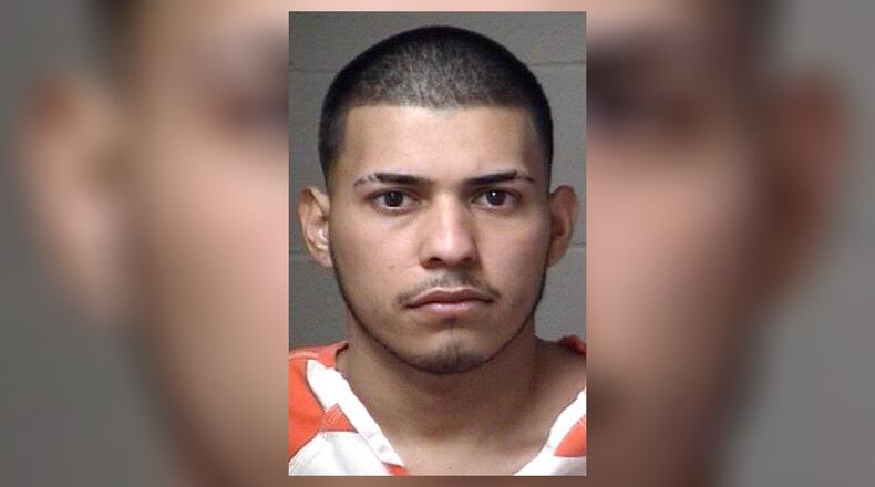 Manuel Dejesus Martinez, 21, was driving a Honda Accord westbound on Ga. 120 when he struck a construction worker, according to the Georgia State Patrol.