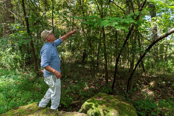 Matthew “Twig” Largess gives a tour of Intrenchment Creek Park in DeKalb County on Monday, August 29, 2022. (Arvin Temkar / arvin.temkar@ajc.com)