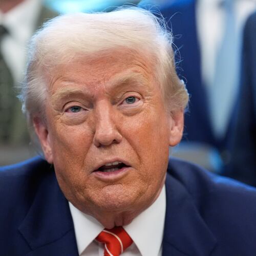 President Donald Trump speaks to reporters after signing a spending bill that ends a partial shutdown of the federal government in the Oval Office of the White House, Tuesday, Feb. 3, 2026, in Washington. (AP Photo/Alex Brandon)
