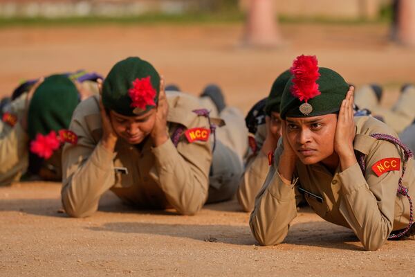 National Cadet Corps members participate during a mock drill to train civilians and security personnel to respond in case of attack, in Guwahati, India, Wednesday, May 7, 2025 amid rising fears of wider conflict following India's strikes in Pakistan. (AP Photo/Anupam Nath)