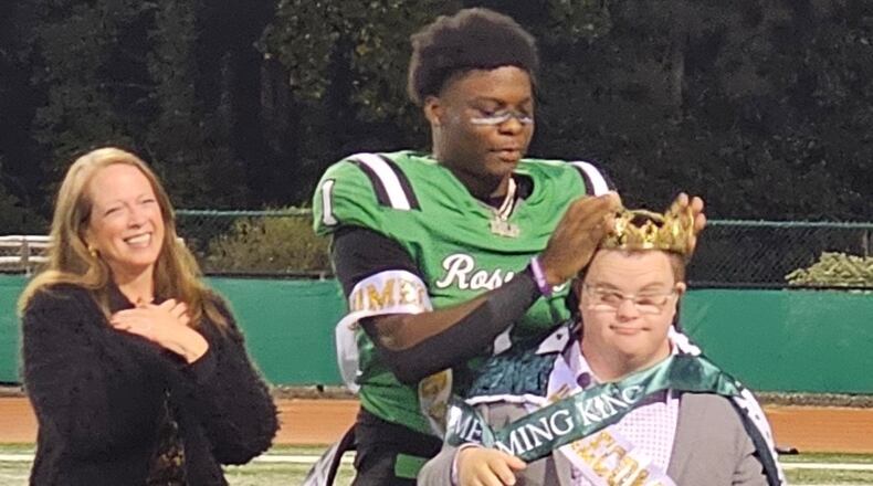 Roswell quarterback Trey Smith was named homecoming king and promptly redirected the honor to team student assistant Jake Jeffries. (Photo: Cassidy Windsor)
