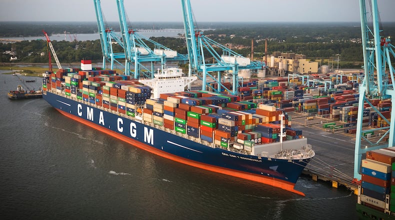 This Monday Aug. 28, 2017 image provided by the Port of Virginia shows the CMA CGM Theodore Roosevelt being unloaded at the Virginia International Gateway in Norfolk, Va. The arrival of the ship breaks the record for largest container ship ever to visit the Port of Virginia and the East Coast. (Keith Lanpher/Port of Virginia via AP)