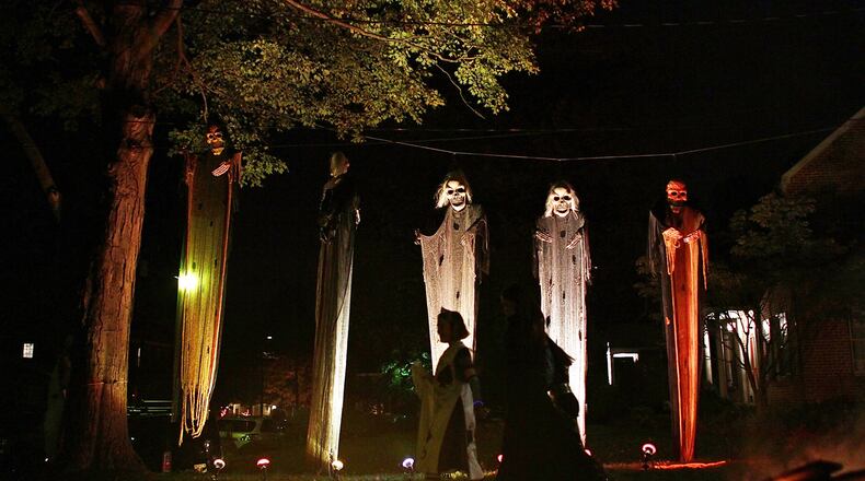 Kids go trick or treating.