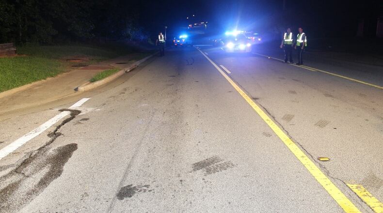 Gwinnett police are investigating a deadly crash between a motorcycle and an Audi Q5.