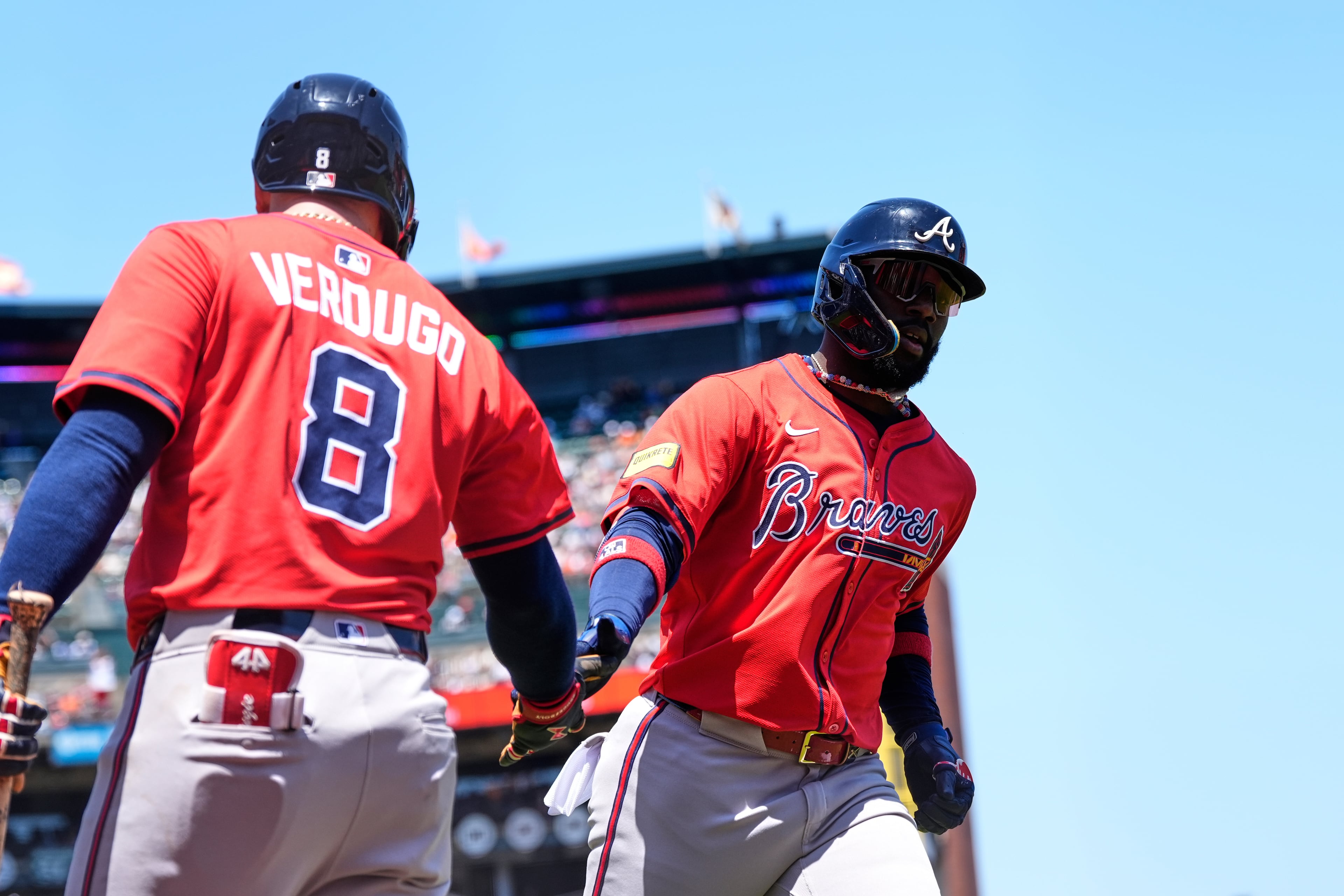 Atlanta Braves' Michael Harris II, right, celebrates with Alex Verdugo after hitting a solo home run during the fifth inning of a baseball game against the San Francisco Giants, Saturday, June 7, 2025, in San Francisco. (AP Photo/Godofredo A. Vásquez)