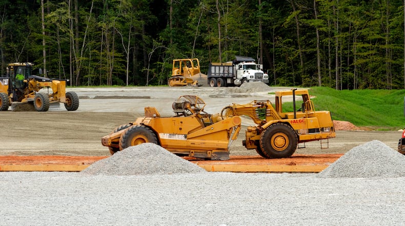 Construction of the recycling plant across the street from the Decatur subdivision Windsor Downs continues Friday, July 24, 2020. STEVE SCHAEFER FOR THE ATLANTA JOURNAL-CONSTITUTION