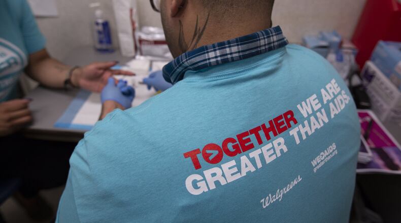 An unidentified man takes advantage of free and fast HIV testing offered last year at Walgreens. BUSINESS WIRE