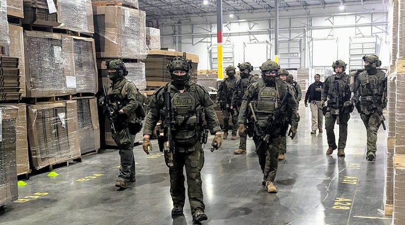 Special agents inside a Wellmade Industries plant in Cartersville, Georgia, on Wednesday, March 26, 2025.