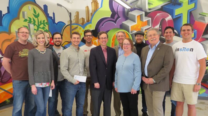 Prototype Prime, Peachtree Corners’ startup incubator. Pictured are five of the new startups enrolled at Prototype Prime along with Mayor Mike Mason, (gray jacket, blue shirt), and next to him Councilmembers Jeanne Aulbach, (Post 5) and Eric Christ (Post 2) and in the back row directly behind Councilmember Aulbach, Weare Gratwick, (Post 6).