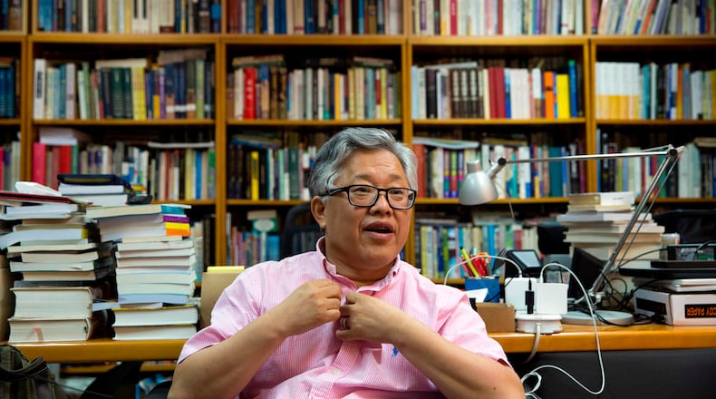 FILE - Pastor Ezra Jin Mingri speaks during an interview at the Zion Church in Beijing, China, Wednesday, Aug. 1, 2018. (AP Photo/Ng Han Guan, file)