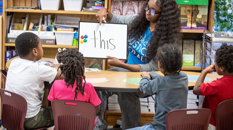 Taylar Morgan works with her kindergarten students on their reading skills at Kimberly Elementary School Tuesday, Dec. 5, 2023. (Steve Schaefer/steve.schaefer@ajc.com)