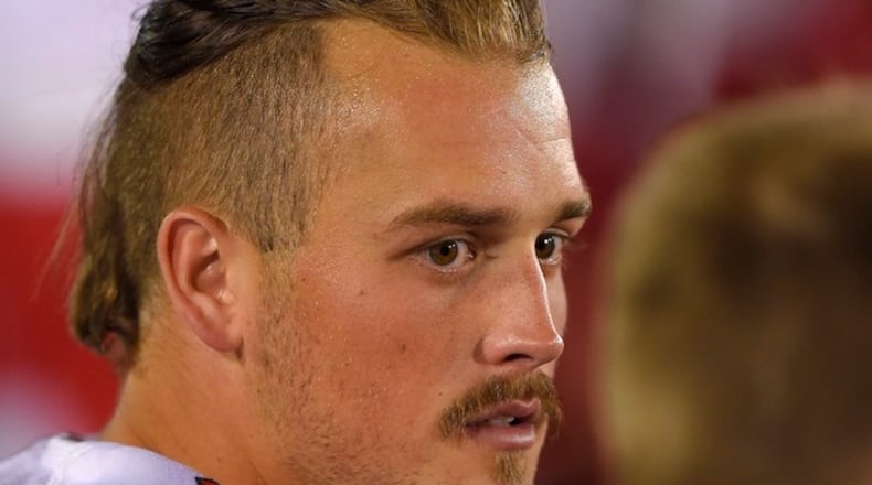 Utah punter Tom Hackett sits on the bench during the second half of an NCAA college football game against Southern California, Saturday, Oct. 24, 2015, in Los Angeles. Southern California won 42-24. (AP Photo/Mark J. Terrill)