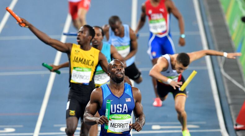 United States' Lashawn Merritt crosses the line to win the men's 4x400-meter relay final during the athletics competitions of the 2016 Summer Olympics at the Olympic stadium in Rio de Janeiro, Brazil, Saturday, Aug. 20, 2016. (AP Photo/Martin Meissner)