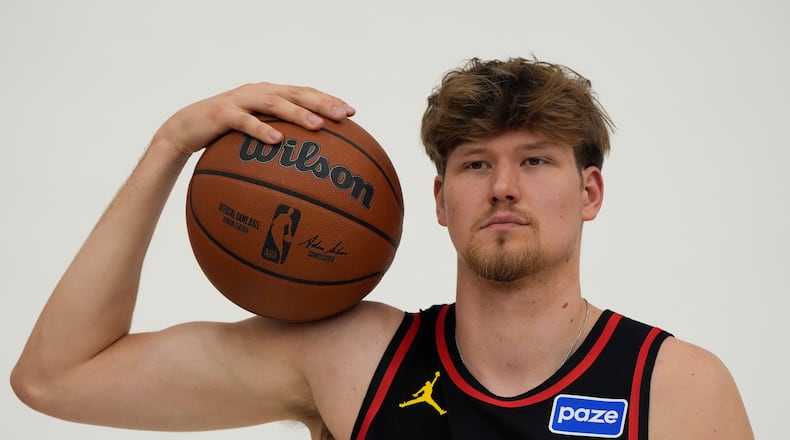 Henri Veesaar poses for a photo during a Hawks news conference announcing three new players on Thursday, June 25, 2026, in Atlanta. (Mike Stewart/AP)