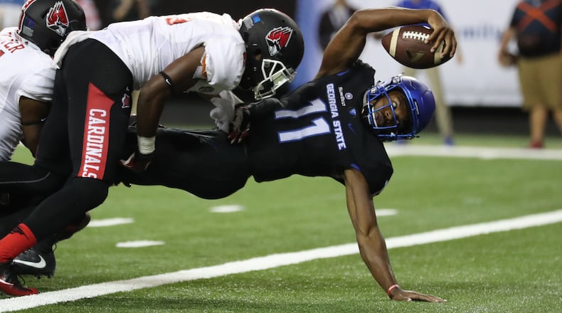 Georgia State quarterback Aaron Winchester (11) dives in the end zone for a touchdown vs. Ball State earlier this season. PHOTO / JASON GETZ
