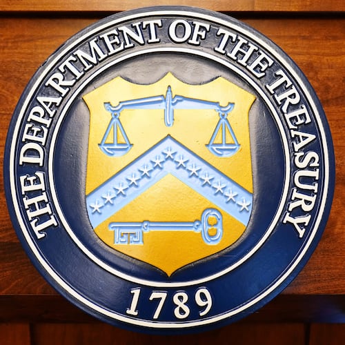 The seal of the Treasury Department is pictured before Treasury Secretary Scott Bessent arrives to speak at a news conference, Monday, Aug. 24, 2026, at the Treasury Department in Washington. (AP Photo/Julia Demaree Nikhinson)