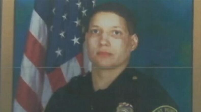 Police say East Point Corporal Crystal A. Parker was shot in the head.