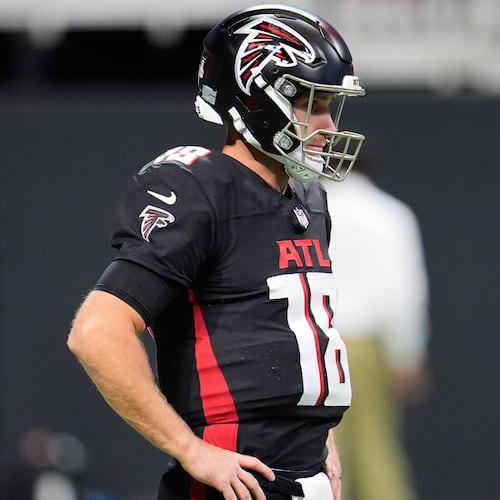Atlanta Falcons quarterback Kirk Cousins (18) warms up before an NFL football game against the Washington Commanders, Sunday, Sept. 28, 2025, in Atlanta. (AP Photo/Mike Stewart)
