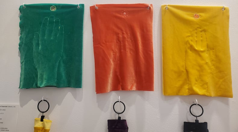 Emmanuelle Chammah's artwork, 'Hand Hugs', is on display at the The Reeves House Visual Arts Center.  (Photo Courtesy of Jayla McDaniel/Fresh Take Georgia)
