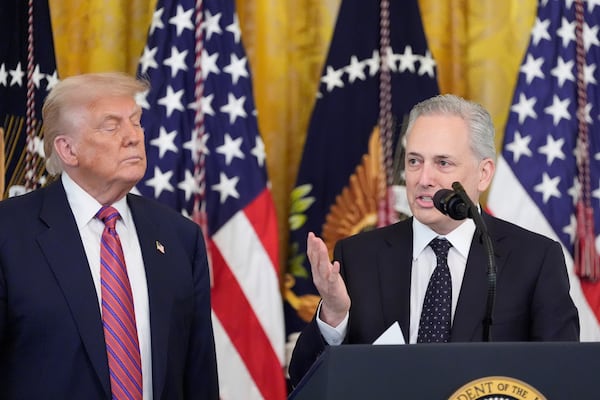 White House AI and crypto czar David Sacks speaks as President Donald Trump listens at an event for the signing of the GENIUS Act, a bill that regulates stablecoins, a type of cryptocurrency, in the East Room of the White House, Friday, July 18, 2025, in Washington. (AP Photo/Alex Brandon)