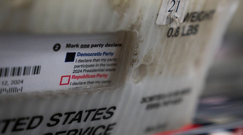 FILE - Vote-by-mail ballots for the presidential primary election are seen on March 12, 2024, at the Clark County Elections Office in Vancouver, Wash. (AP Photo/Jenny Kane, File)