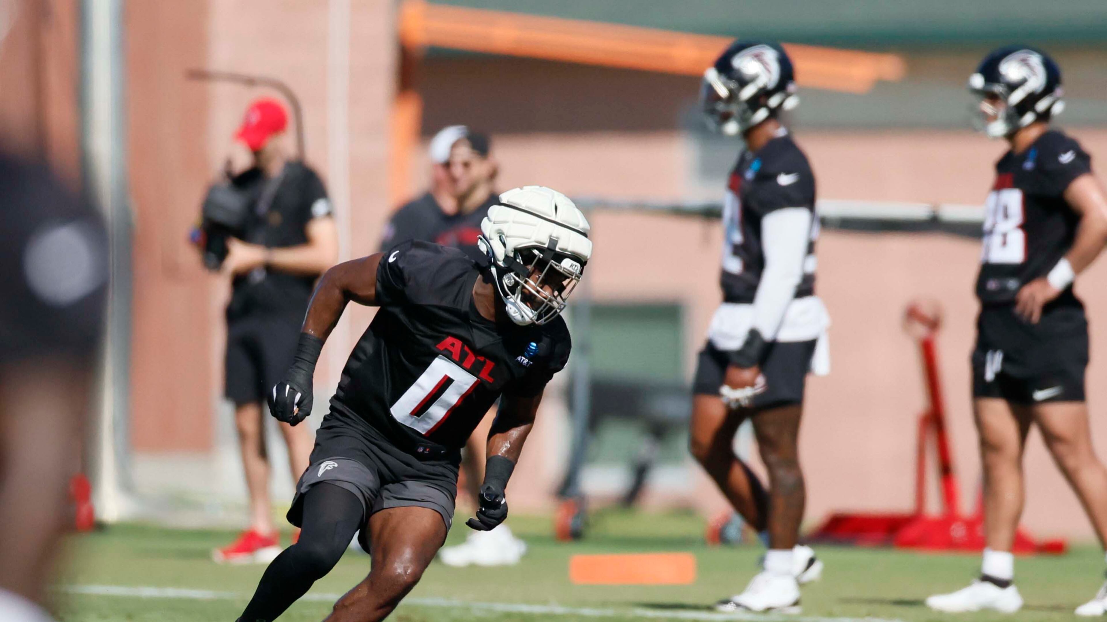Atlanta Falcons linebacker Divine Deablo runs as he works on a drill during training camp at the Falcons practice facility, on Sunday, July 27, in Flowery Branch, Ga. (Miguel Martinez/AJC)