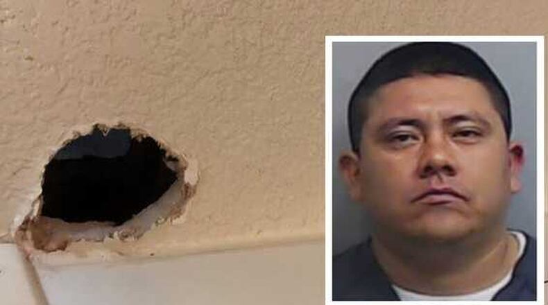 Christian Garcia Castillo (right) was arrested by Roswell police after allegedly peering at a woman through a hole in the wall of a hotel.