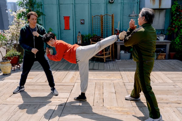 This image released by Sony Pictures shows, from left, Ralph Macchio, Ben Wang and Jackie Chan in a scene from "Karate Kid: Legends." (Jonathan Wenk/Sony Pictures via AP)