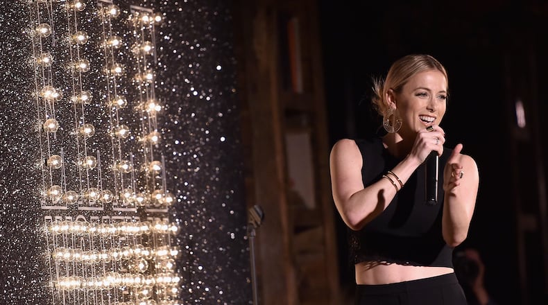 WEST HOLLYWOOD, CA - JUNE 07: Comedian Iliza Shlesinger performs onstage during ELLE Women In Comedy event hosted by ELLE Editor-in-Chief Robbie Myers and Leslie Jones, Melissa McCarthy, Kate McKinnon and Kristen Wiig on June 7, 2016 at Hyde Sunset in Los Angeles, California; presented by Secret Deodorant and emceed by Jane Lynch with stand-up performances by Michelle Buteau, Nikki Glaser, Iliza Shlesinger, and Ali Wong. (Photo by Mike Windle/Getty Images for ELLE)