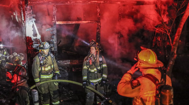 Two women and four men were killed early Monday, March 7, 2016, in a house fire in northwest Atlanta in the 1400 block of Andrews Street, said Atlanta Fire Rescue spokesman Cortez Stafford. The investigation is ongoing, he said. JOHN SPINK / JSPINK@AJC.COM