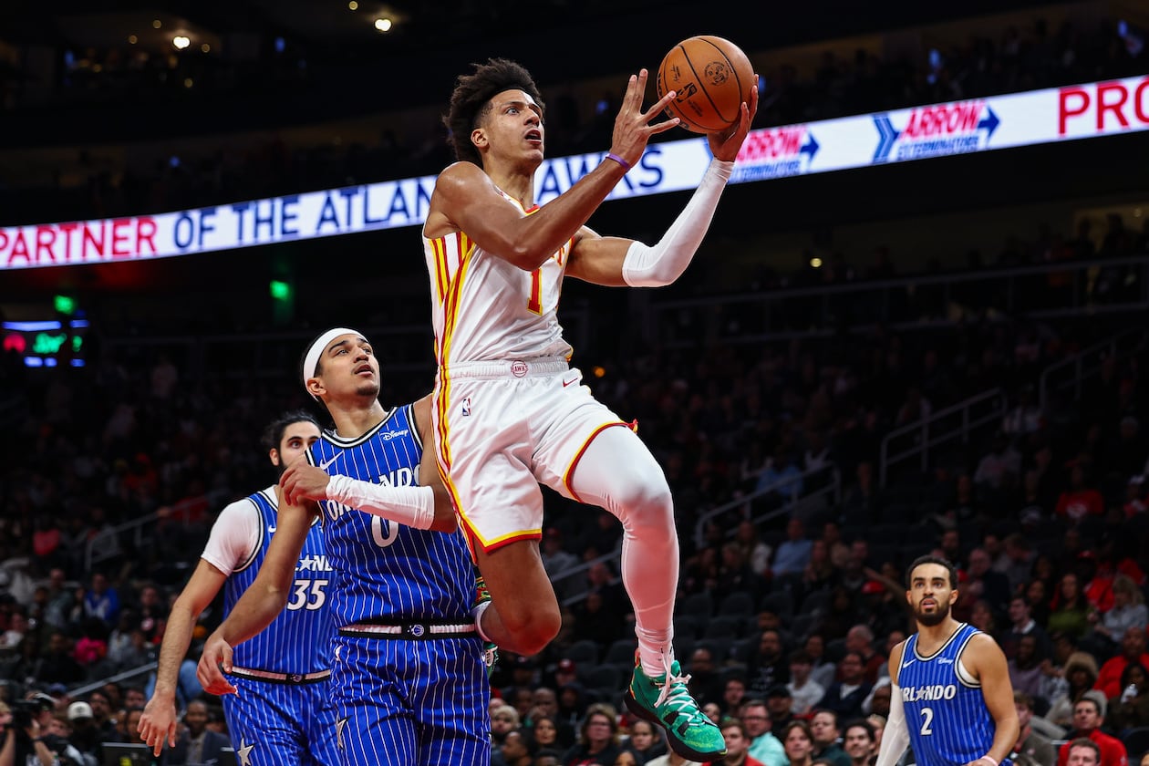 Atlanta Hawks forward Jalen Johnson (1) shoots the ball during the first half of an NBA basketball game against the Orlando Magic, Tuesday, Nov. 4, 2025, in Atlanta. (AP Photo/Colin Hubbard)